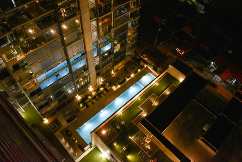 a view of a large building and lights all around it