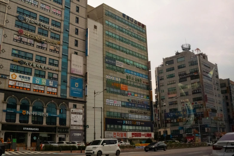 large buildings lining the edge of a road