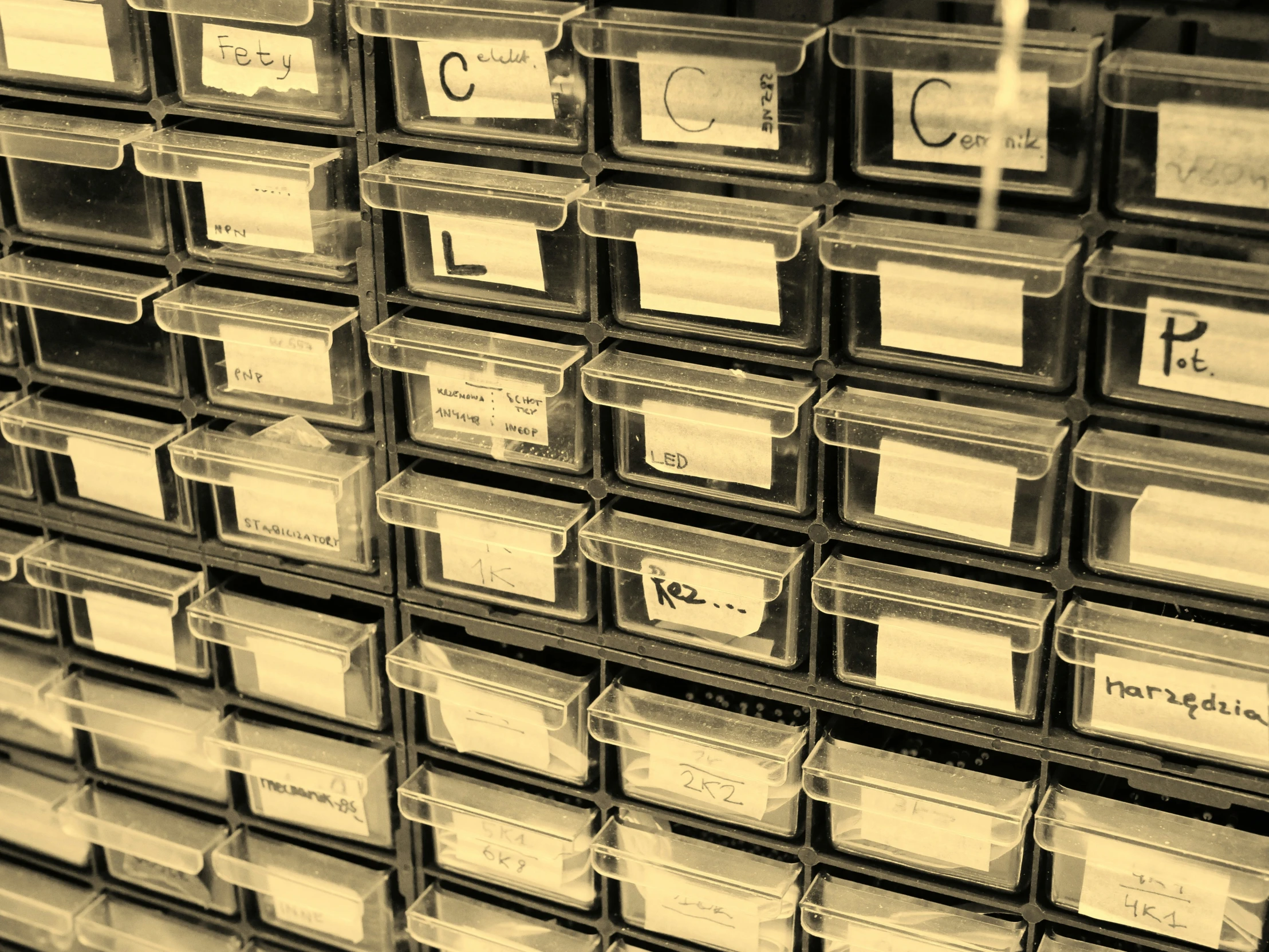 a close up of drawers with name tags