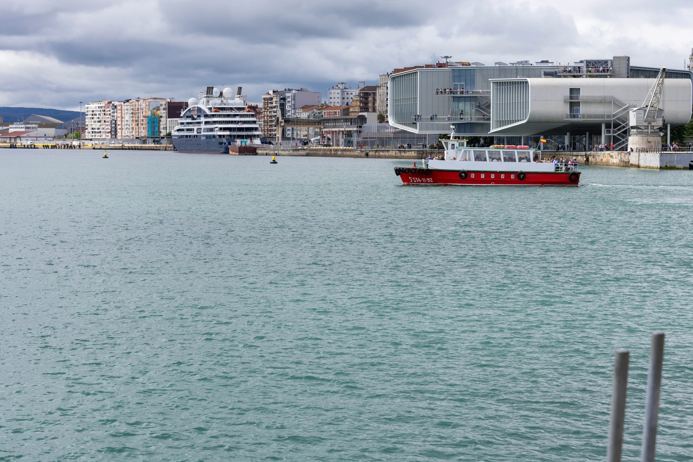 the boat is floating in the clear water