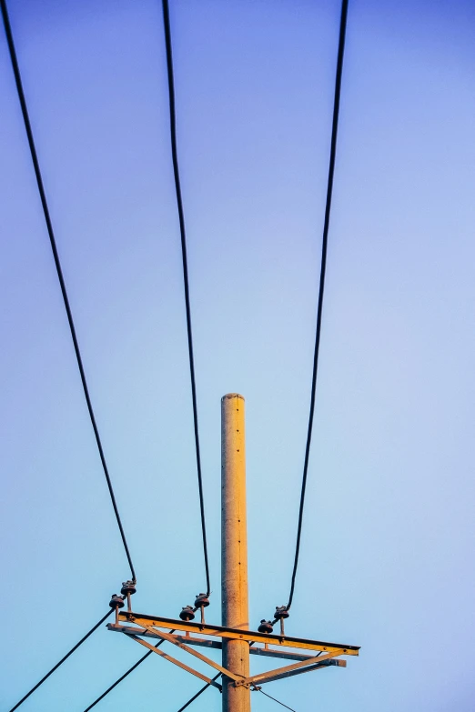 the pole is standing in front of a blue sky