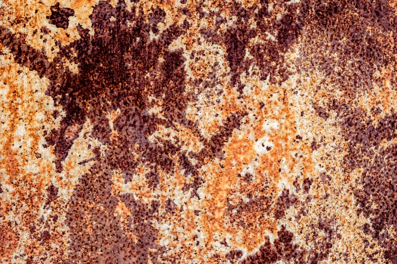 rusted metal surface with s and patterns