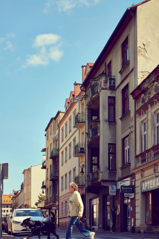 a man riding his skateboard on the city street