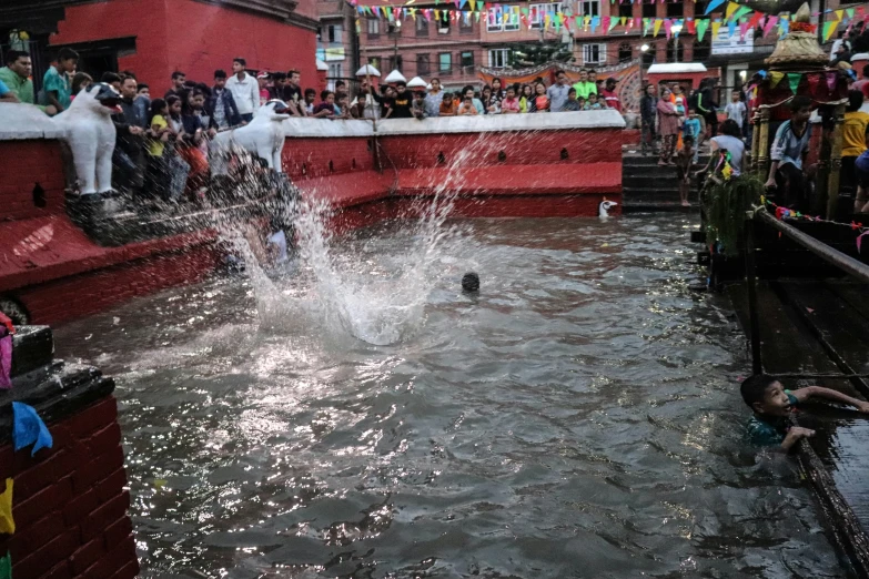 this is an image of a man splashing water