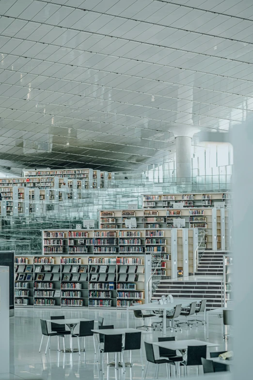 the interior of a liry with a lot of books on shelves