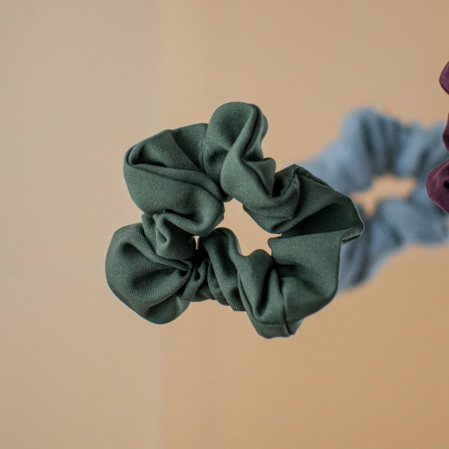 a hair scrunch made out of fabric on top of a table