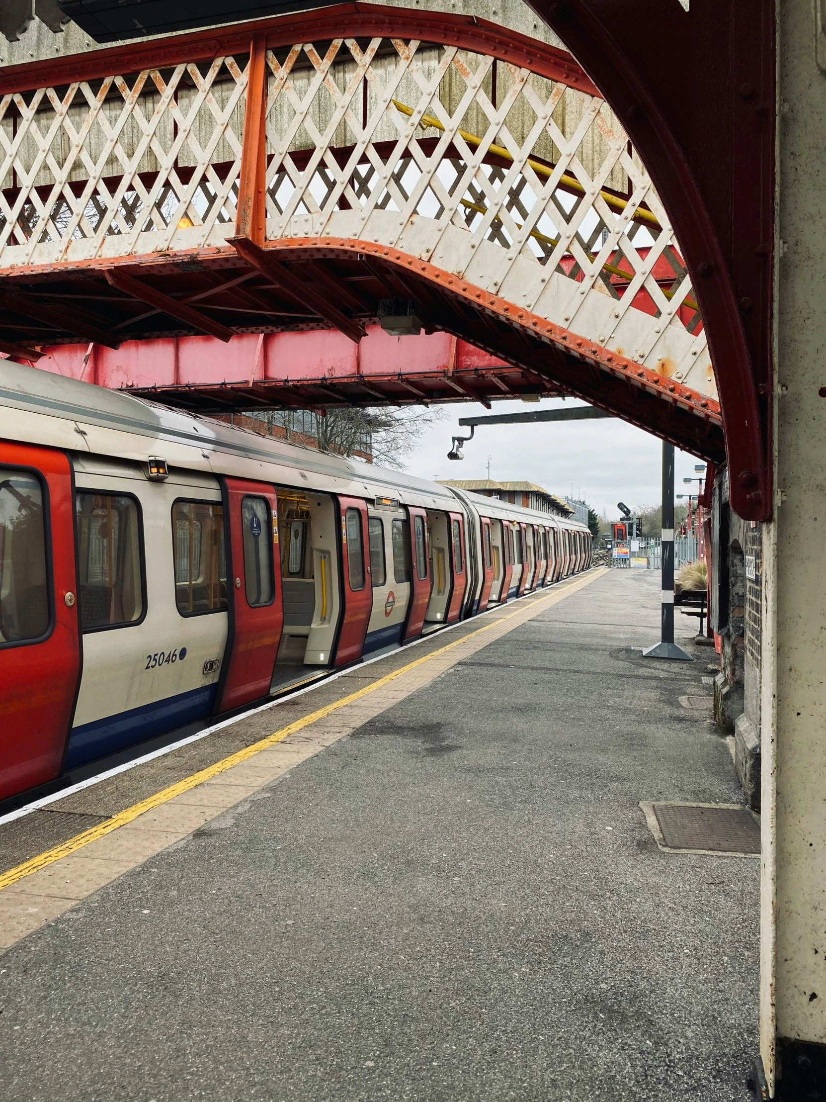 train pulling into the platform in an industrial station