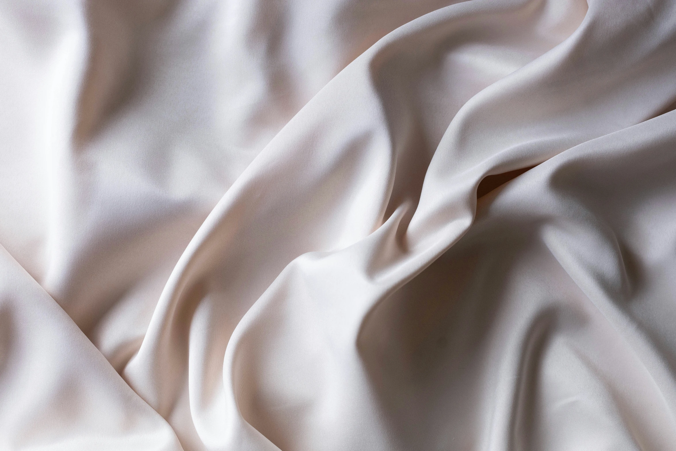 white fabric with ridges in the background