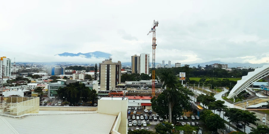 the city skyline is seen with tall buildings in the background