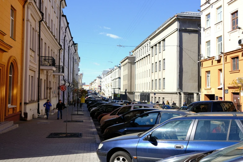 an outdoor parking lot in front of a building