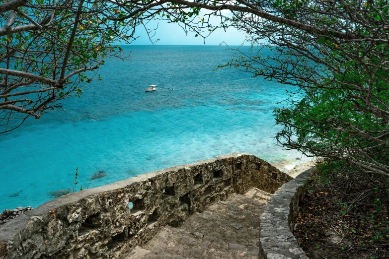 a boat is in the distance on a clear day