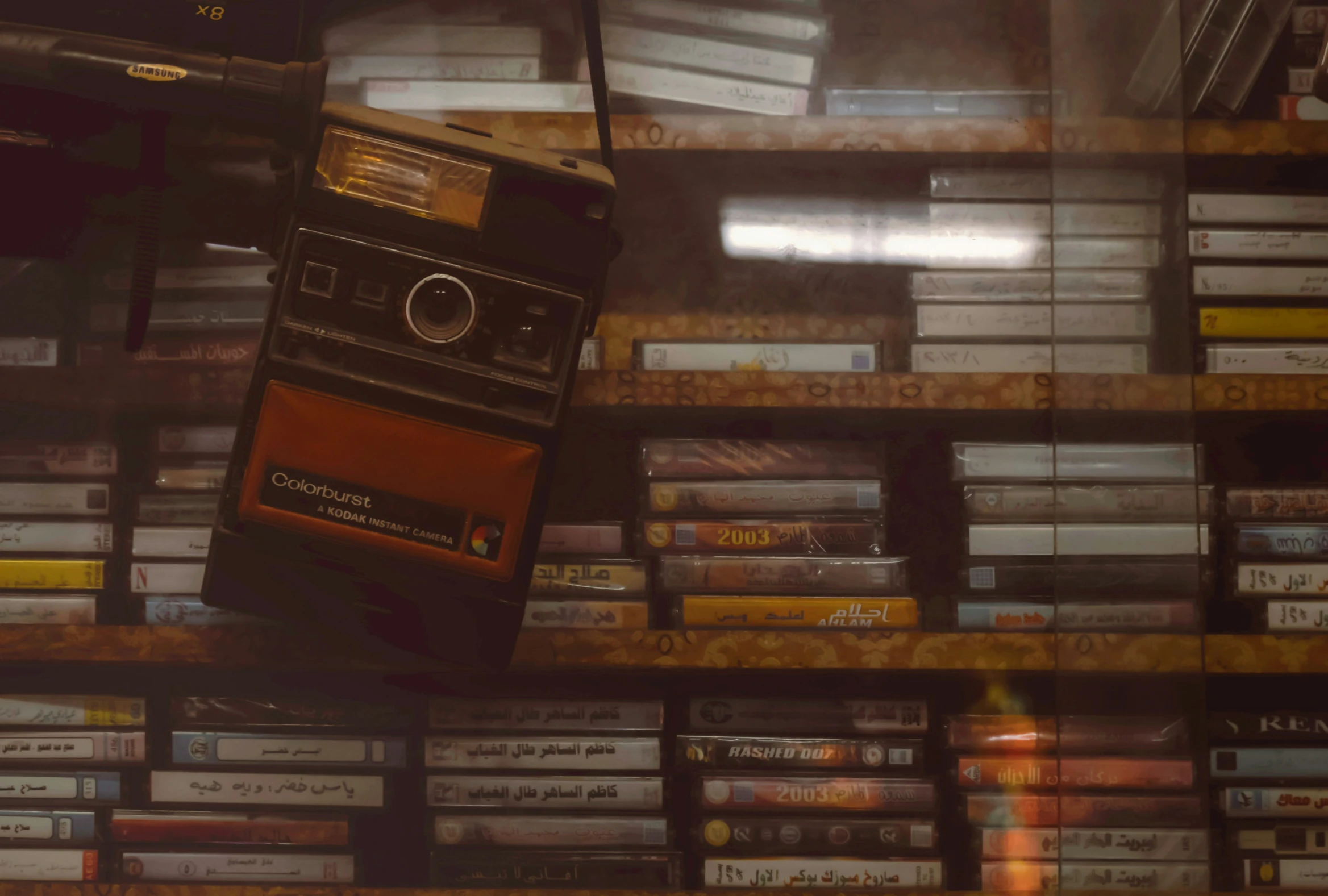 a very old radio sits among some books