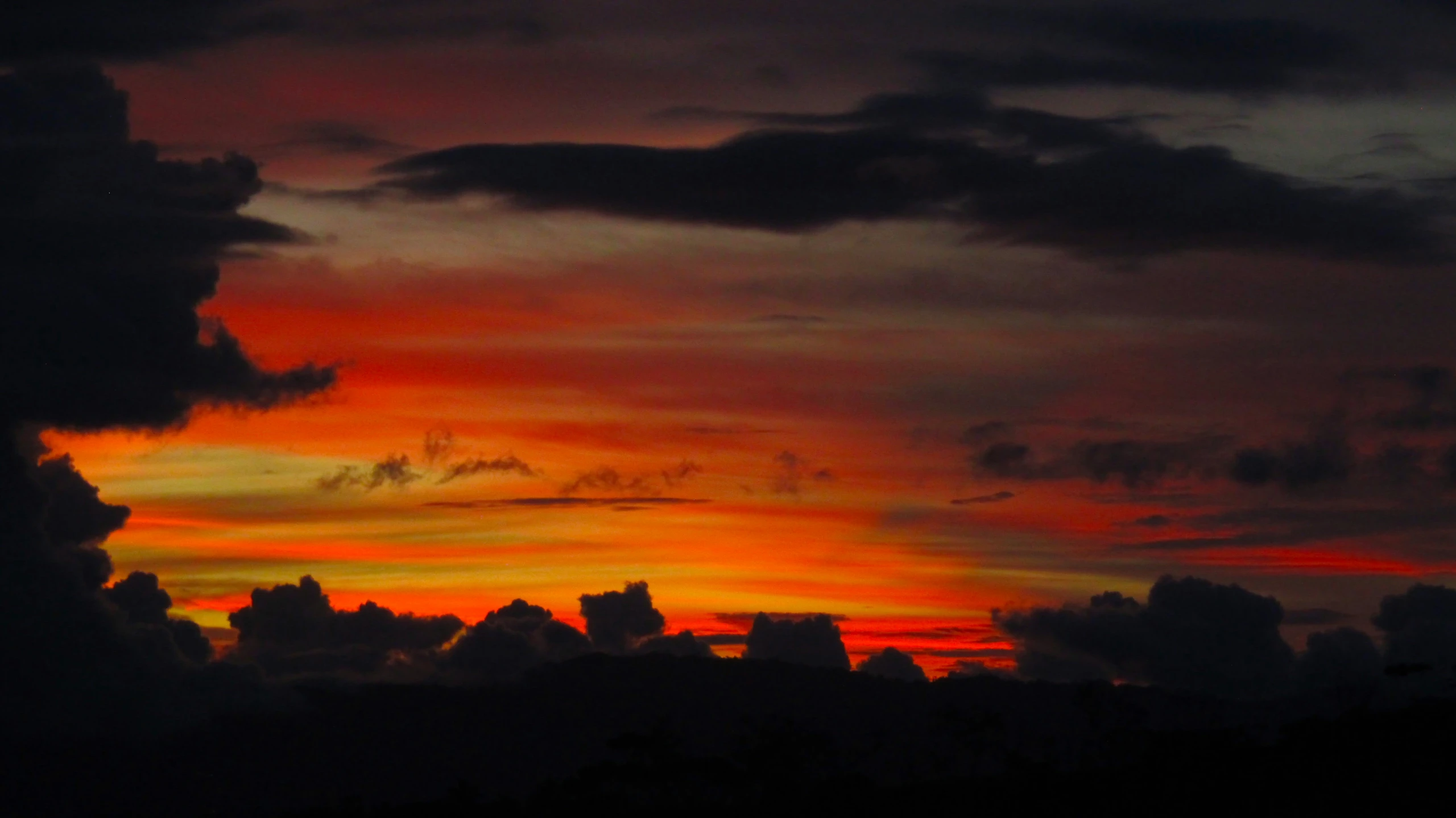 colorful sky showing many clouds with no wind