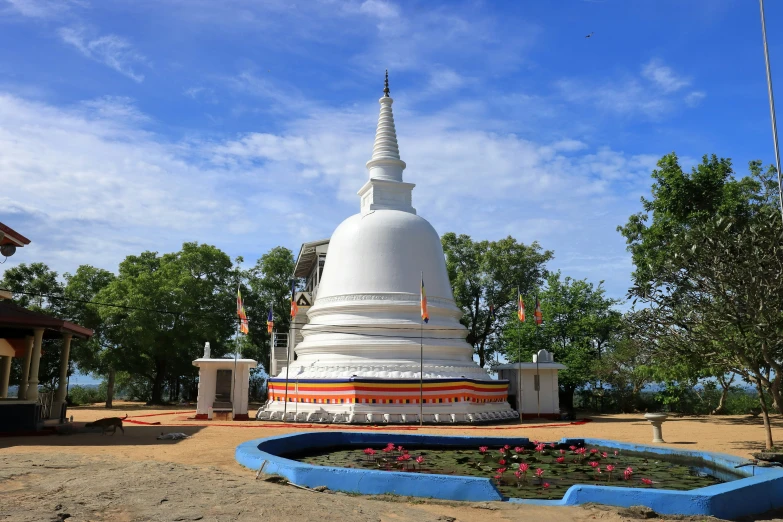 large white building with colorful decoration in the middle