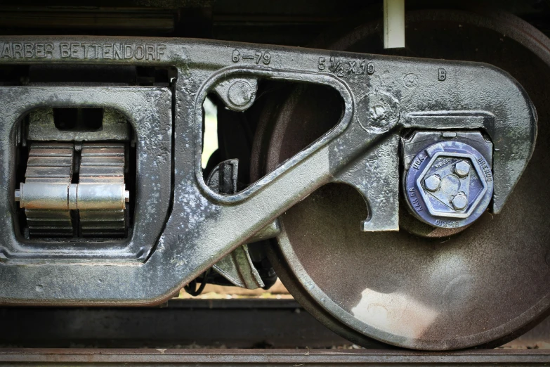 the wheels of a train with metal parts