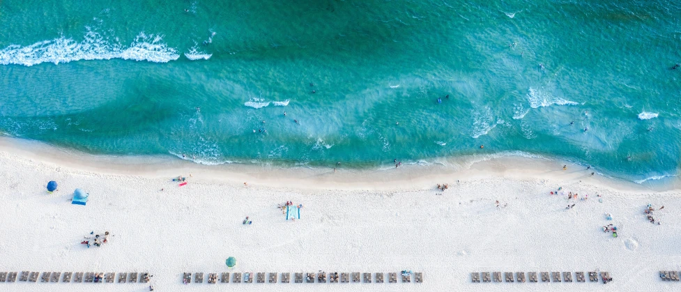 top view of beach and sand area in open ocean