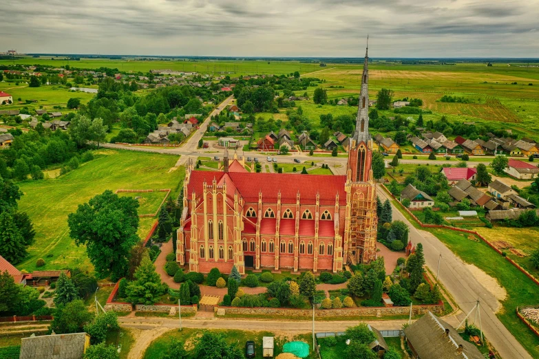 an aerial view of a large red church