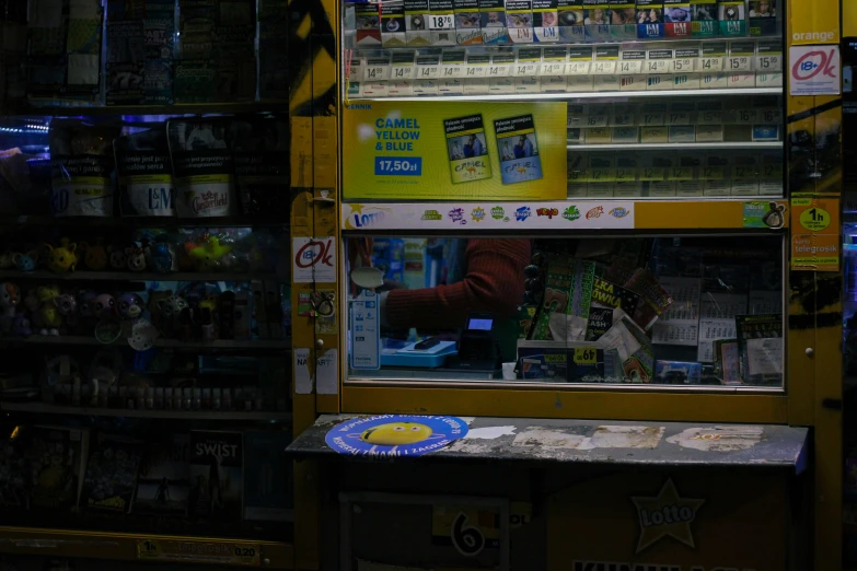 a store with some signs and shelves on the wall