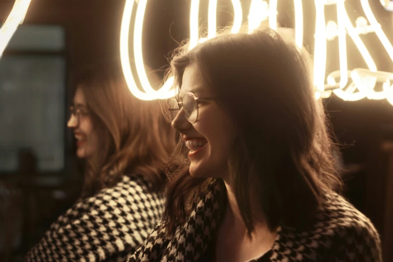 a close up of a person with glasses at night