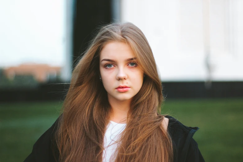 a very pretty lady with long red hair