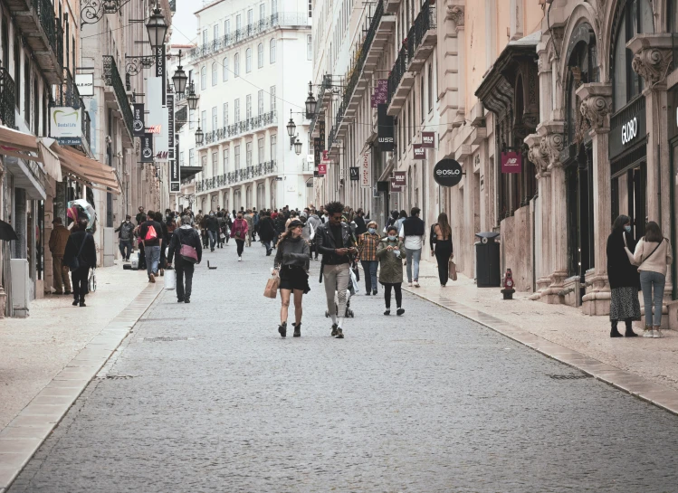 this is an image of people walking down a road