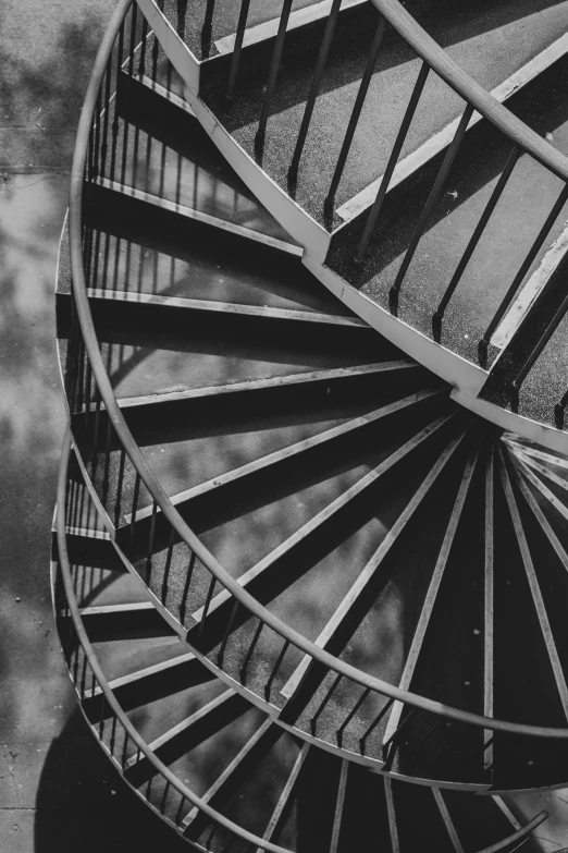 a view of a spiral stair railing