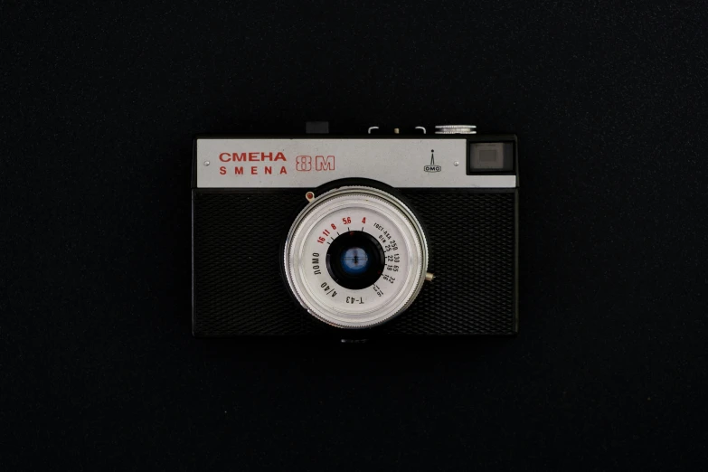 a small camera on black background, with no image