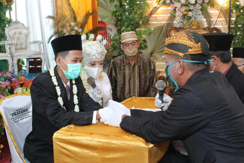 a man and women in formal clothes at an event