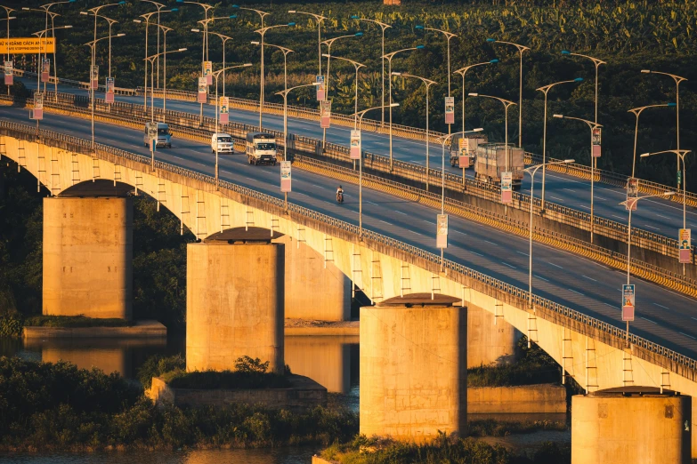 there is a bridge that has many lights on top of it