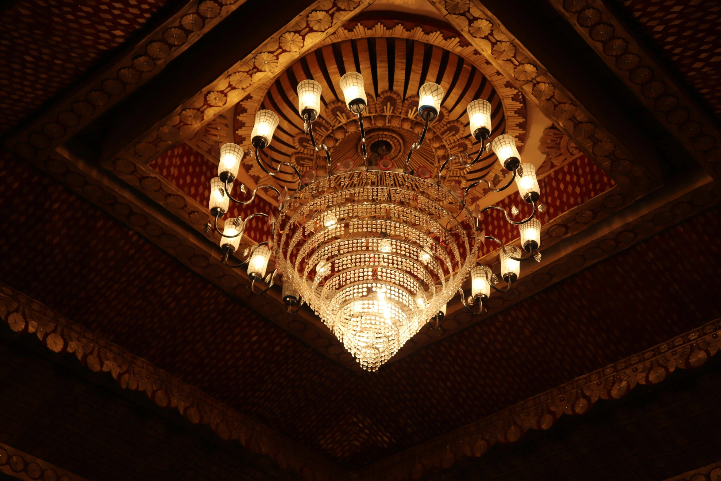 a fancy chandelier hanging from the ceiling