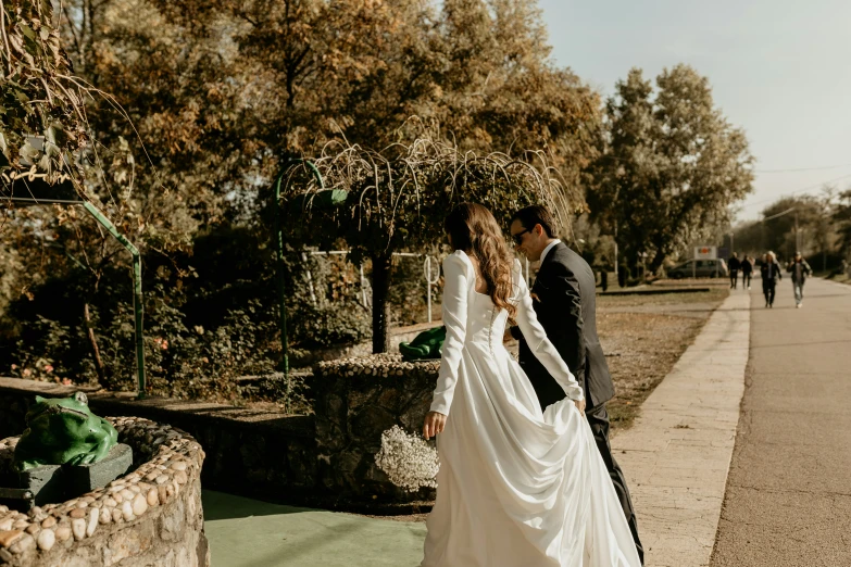 a couple of people that are standing in the street