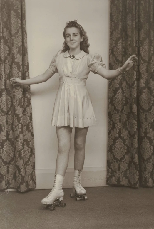 a woman is posing for a pograph in roller skates