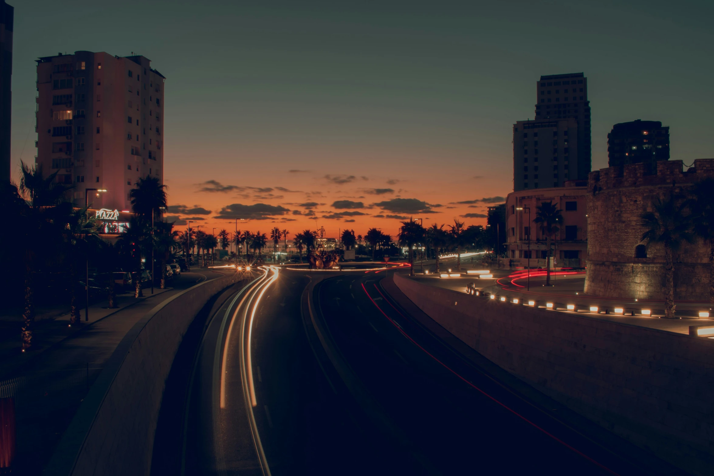 a very long exposure of a city at dusk