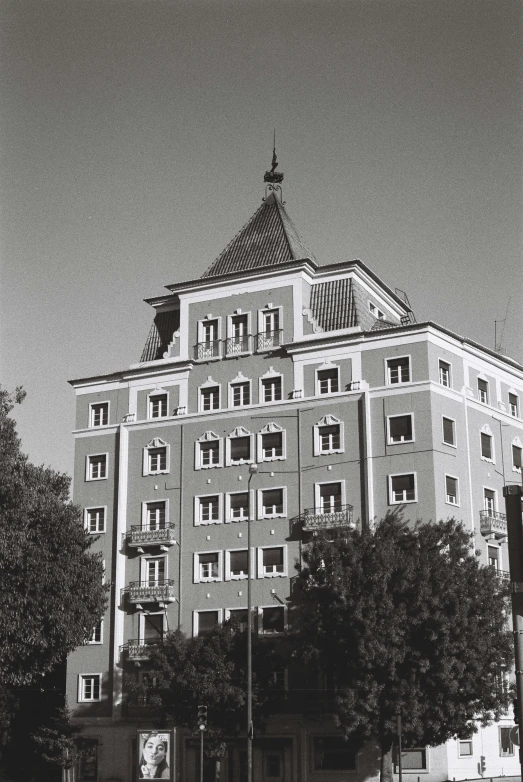 a vintage building is shown with an arched top