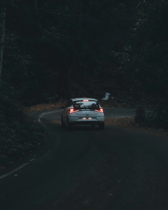 a car that is driving down the road