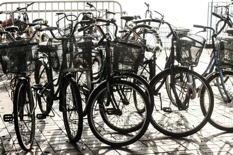 bicycles parked along the walkway at a beach