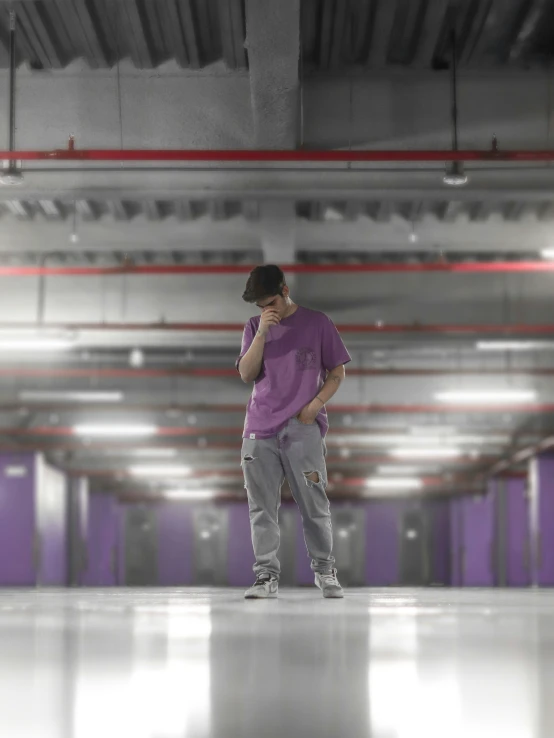 a man is standing in an empty room