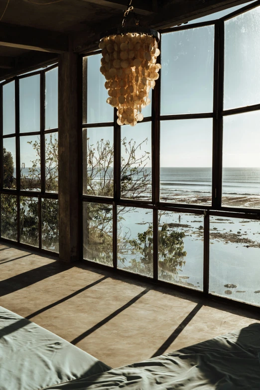 the ocean is seen out through the large windows