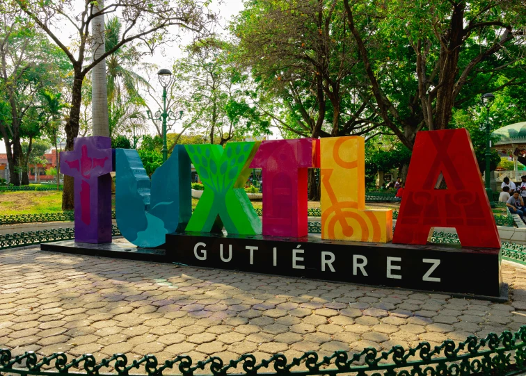 large colorful letters set in the shape of a capital