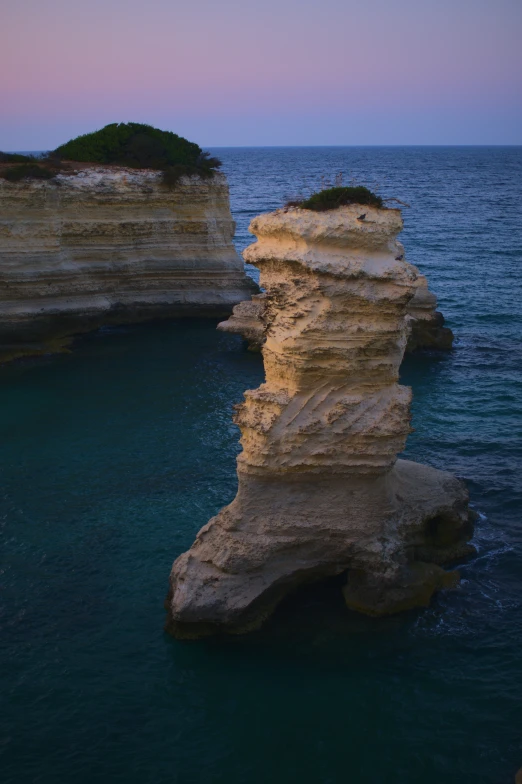 the rock formation looks like it could be in the ocean