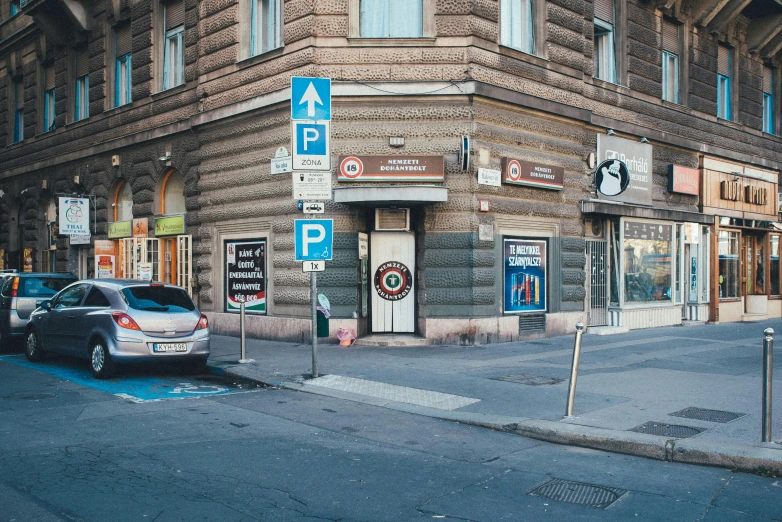 a store with signs on the front and sides of the building