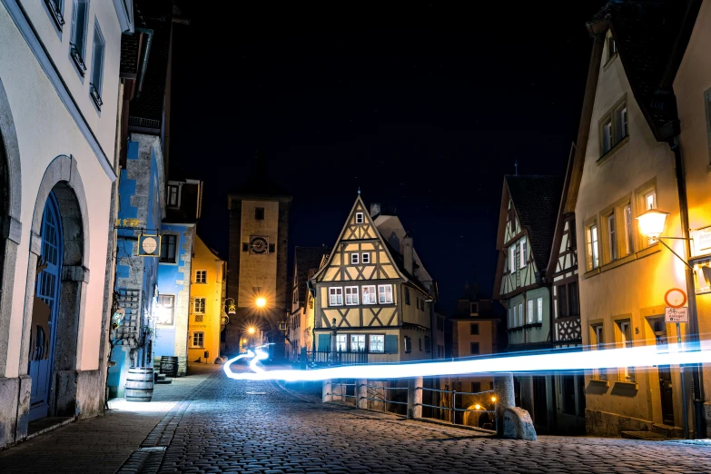 a long exposure s of the street in an old town at night