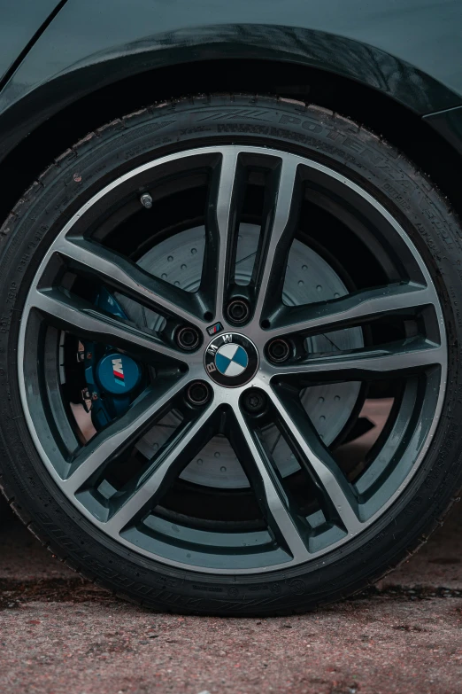 a close up of the front wheel of a car