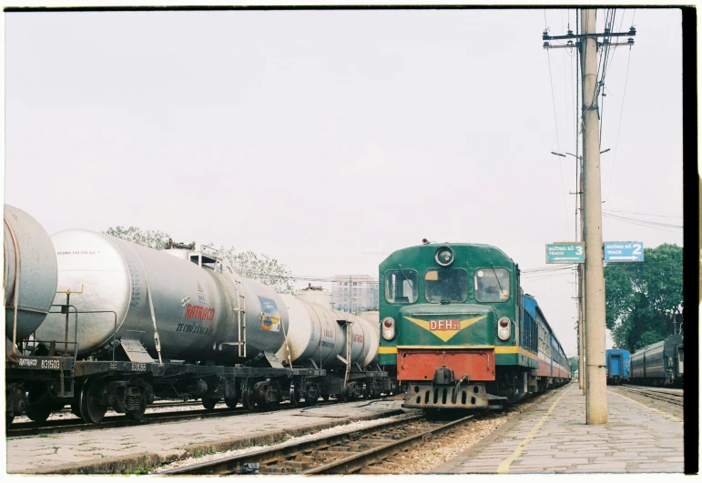 a couple of trains on the tracks in a city