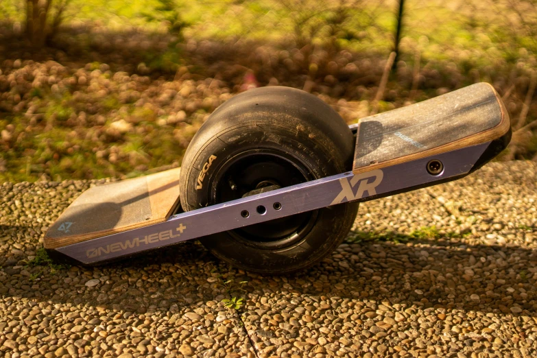 a skateboard on the ground on its side