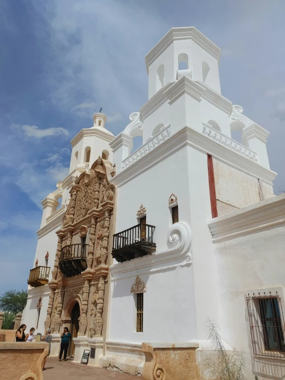 this is a large white building with a tower