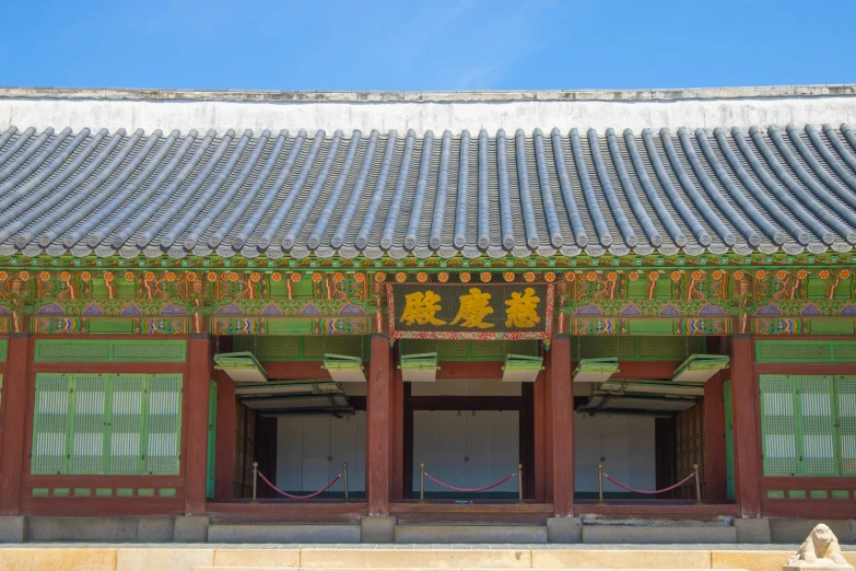 a building with ornate roof tile decoration in an oriental style