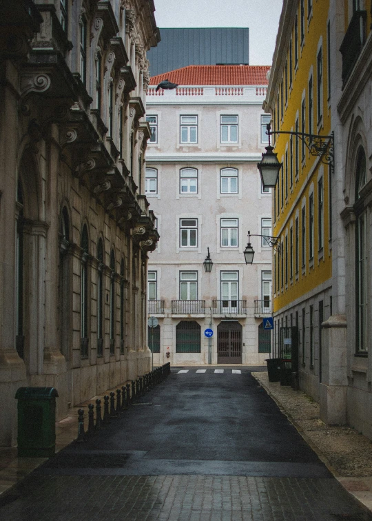 a city street with a few old buildings on the other side