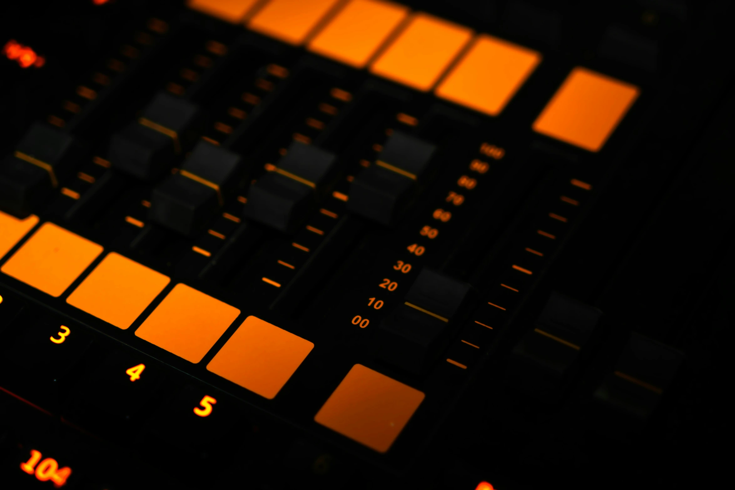an orange and black sound board that is displaying equalizer numbers