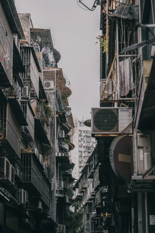 an empty city street with lots of apartment buildings